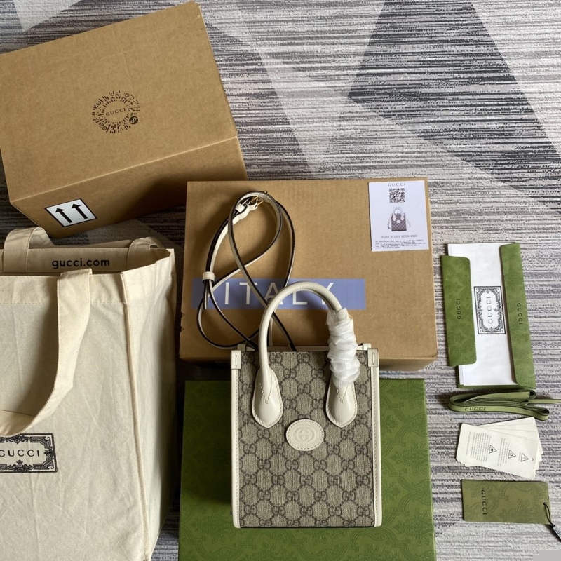 G*u*i shopping bags